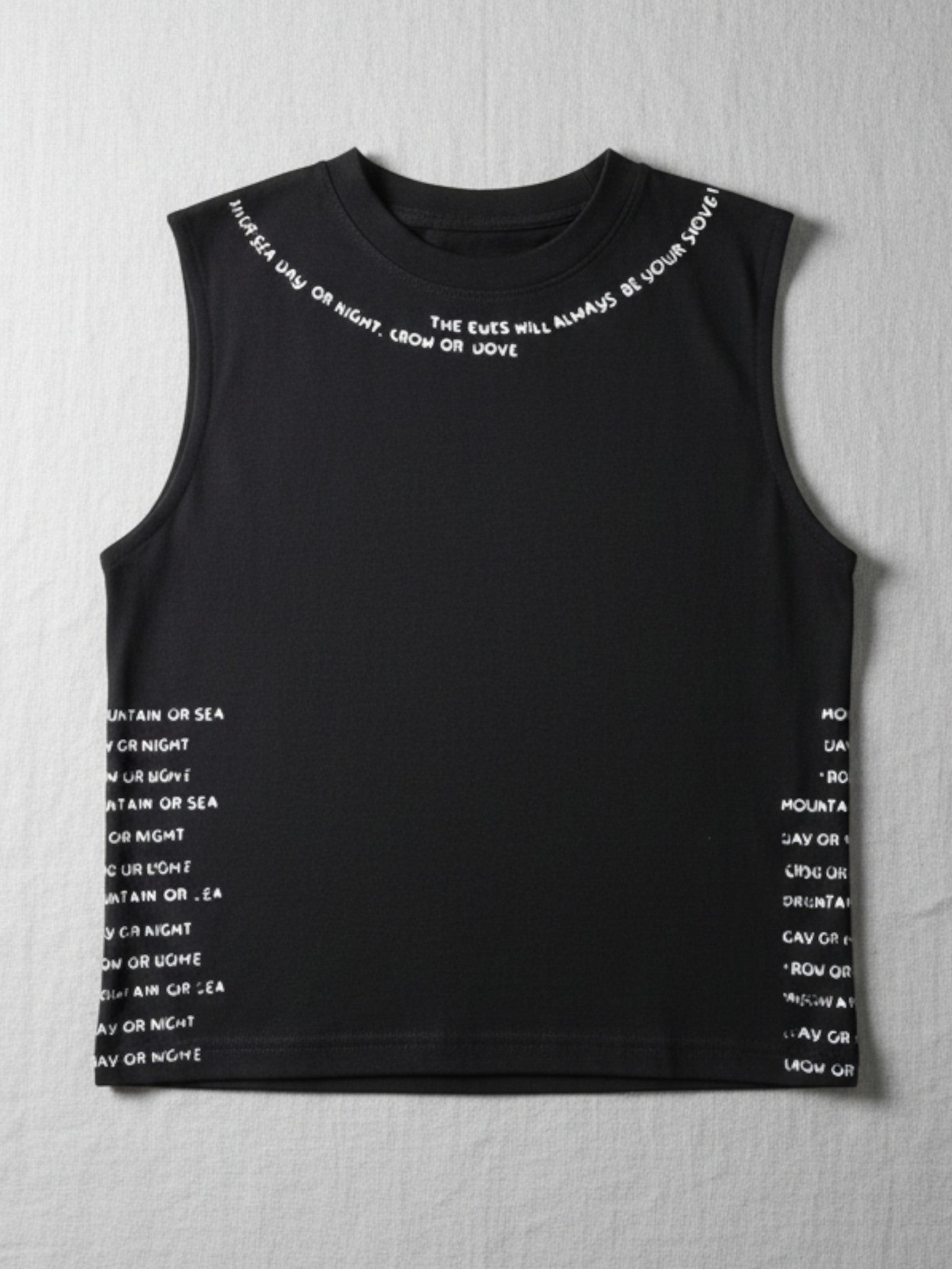 Children's sleeveless black t-shirt featuring white text printed around the crew neckline and along both side seams.