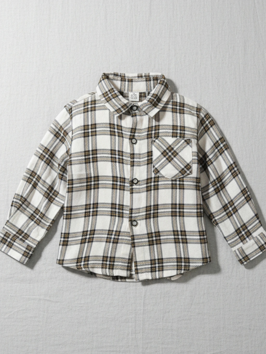 Kids cream and brown plaid long sleeve flannel button-down shirt with a chest pocket 