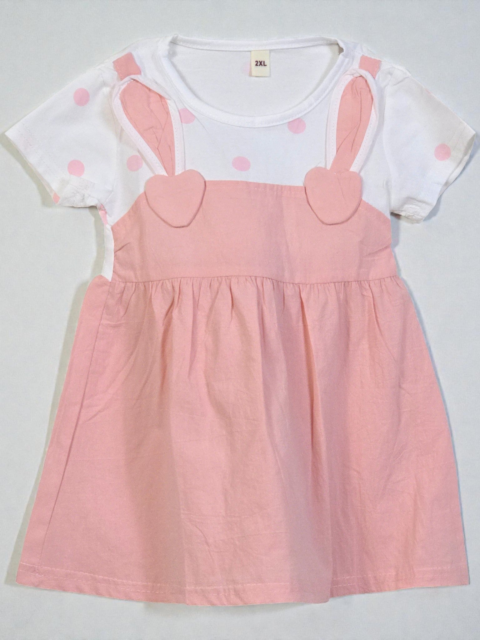White shirt with pink polka dots and pink overall dress. Pink 11