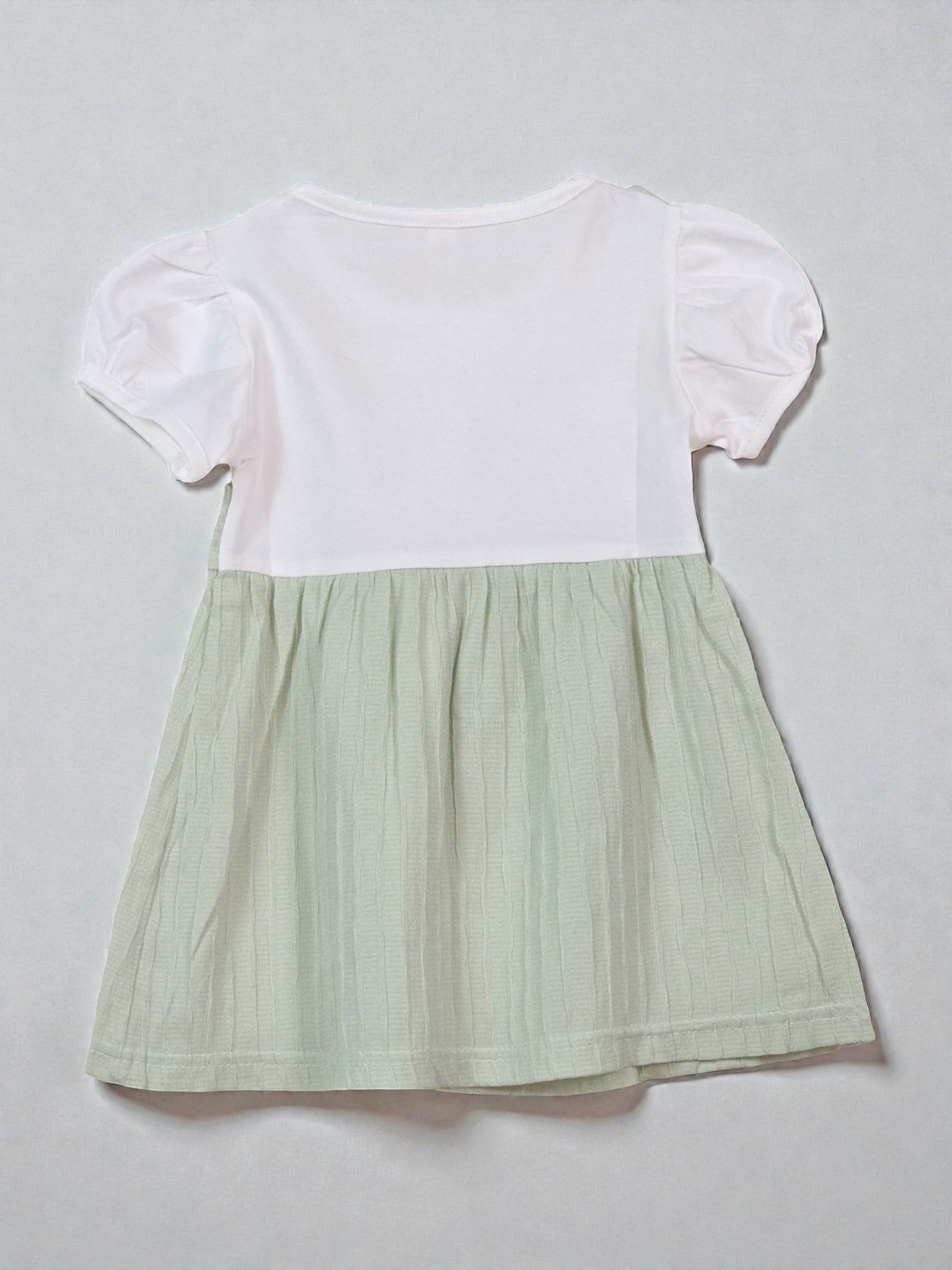 Two-tone dress with white top and green skirt. Sage