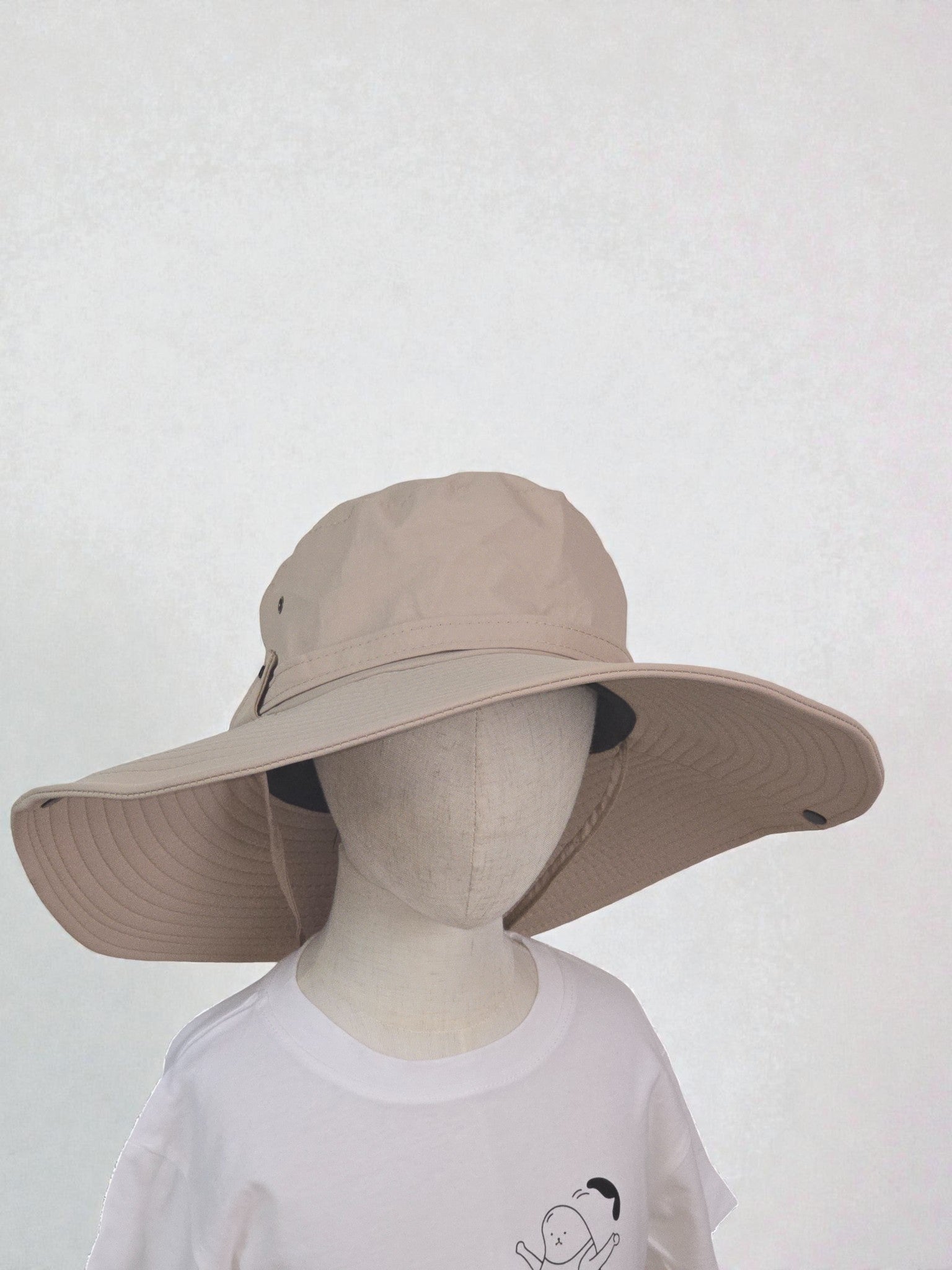 Kids Sun Outdoor Hat beige wide-brimmed hat against a plain background