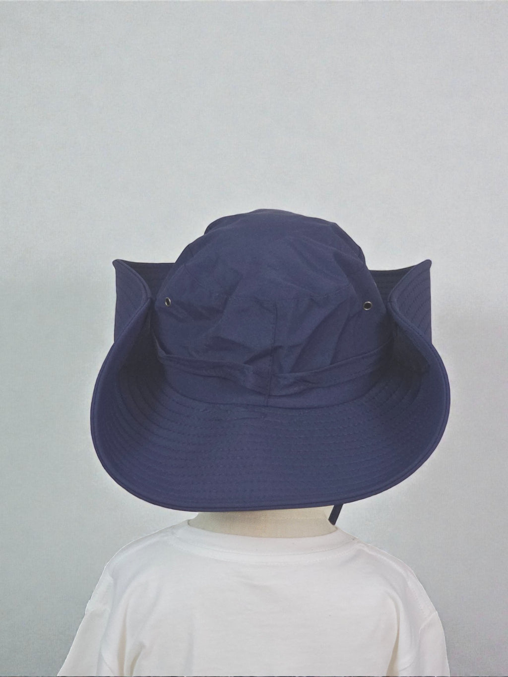 Kids Sun Outdoor Hat Navy foldable wide-brimmed hat against a plain background
