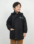 Kids black hooded parka jacket featuring a teal graphic on the chest, adjustable drawstrings, and elasticated cuffs on a light grey textured background