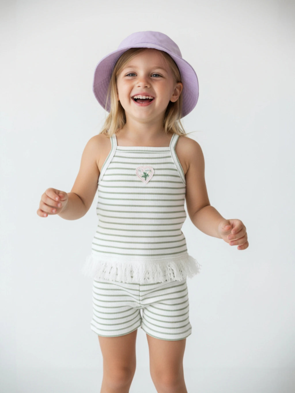 Kids green and white striped waffle knit camisole and shorts set with white fringe trim and heart floral applique.
