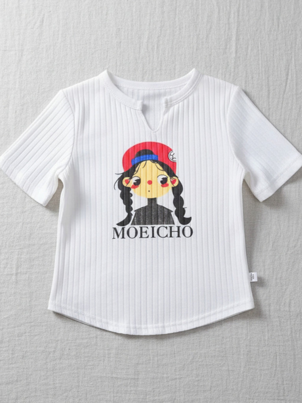 White t-shirt with a graphic of a character wearing a red hat and the text 'MOEICHO' on a gray background.