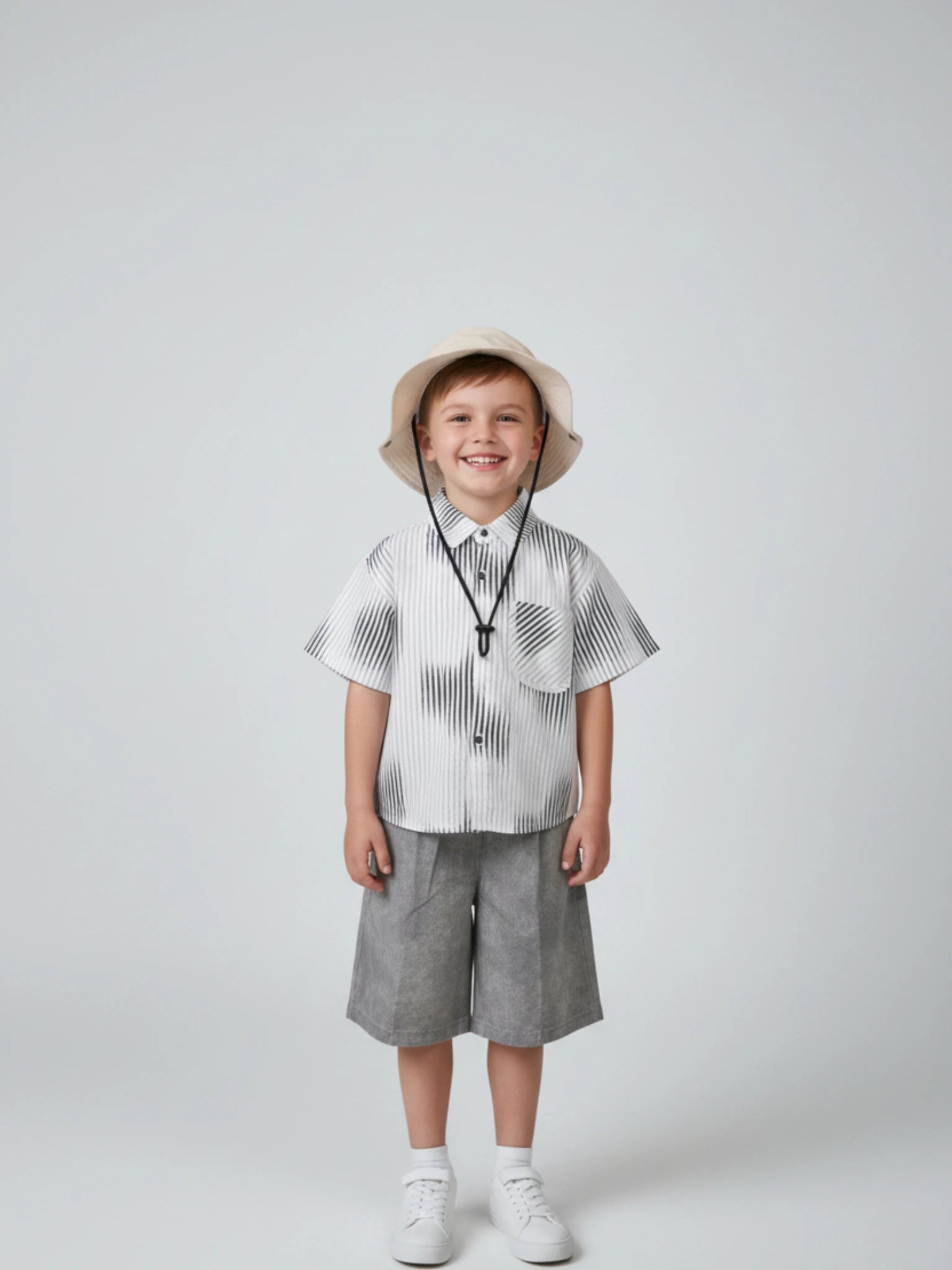 Kids modern black and white abstract striped short sleeve button-down shirt with a chest pocket