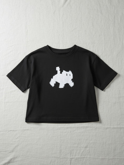 Black t-shirt with a white graphic on a textured white background