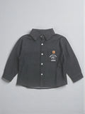 Kids charcoal grey long sleeve button-down shirt featuring a puppy graphic and "William" embroidered on the chest pocket with a tan brand patch.